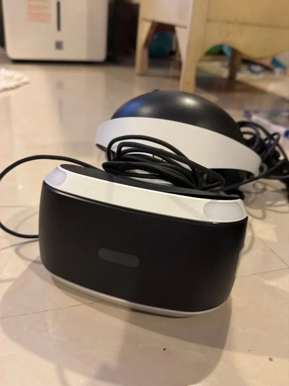 Sony PlayStation VR Headset with Black PS4 Slim Console and Blue/Red Controllers
